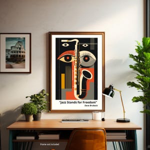 May include: A framed art print featuring a stylized saxophone design with the text "Jazz Stands for Freedom" by Dave Brubeck. The artwork uses a palette of black, orange, and beige. A smaller framed image of the Colosseum is also visible.