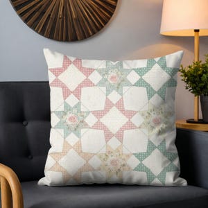 May include: Square throw pillow with a patchwork star pattern in pastel pink, blue, and beige. The pillow features floral accents and a vintage aesthetic, perfect for home decor.