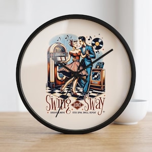 May include: A round wall clock with a black frame featuring a vintage-style illustration of a couple dancing near a jukebox and record player. The text reads Swing and Sway, Groove & Move, Step, Spin, Smile, Repeat. The clock has black hands.