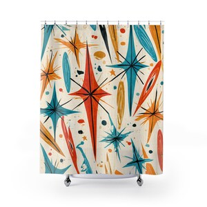 May include: A shower curtain featuring a cream-colored background with a repeating pattern of starburst shapes in shades of orange, teal, and black. The design includes elongated diamond forms and scattered dots, creating a geometric motif.
