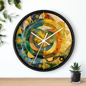 May include: Round wall clock with a black frame and a colorful abstract design. The clock face features a vibrant mix of blues, greens, yellows, and oranges in a circular pattern. White clock hands indicate the time.