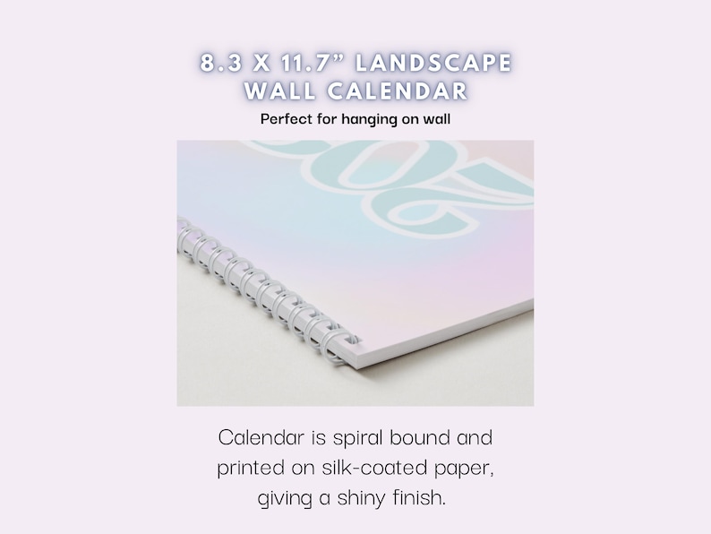 May include: A spiral-bound landscape wall calendar, 8.3 x 11.7 inches, with a pastel-colored design. The calendar is printed on silk-coated paper, giving it a shiny finish. The text on the calendar reads "8.3 X 11.7" LANDSCAPE WALL CALENDAR".