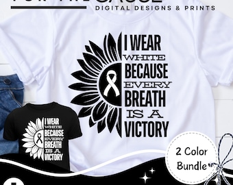 Puede incluir: Una camiseta blanca con un diseño de girasol negro y el texto "Uso blanco porque cada respiración es una victoria". El diseño incluye una cinta blanca en el centro del girasol. El texto "2 Color Bundle" también es visible en la imagen.