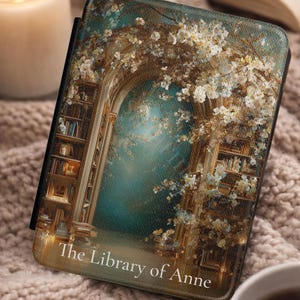 Personalized Kindle case reading The Library of Anne with vintage floral arch and bookshelf artwork in teal and gold tones..