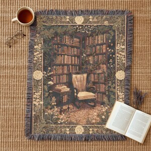 Woven blanket with a warm storybook library scene, draped over a reading chair.