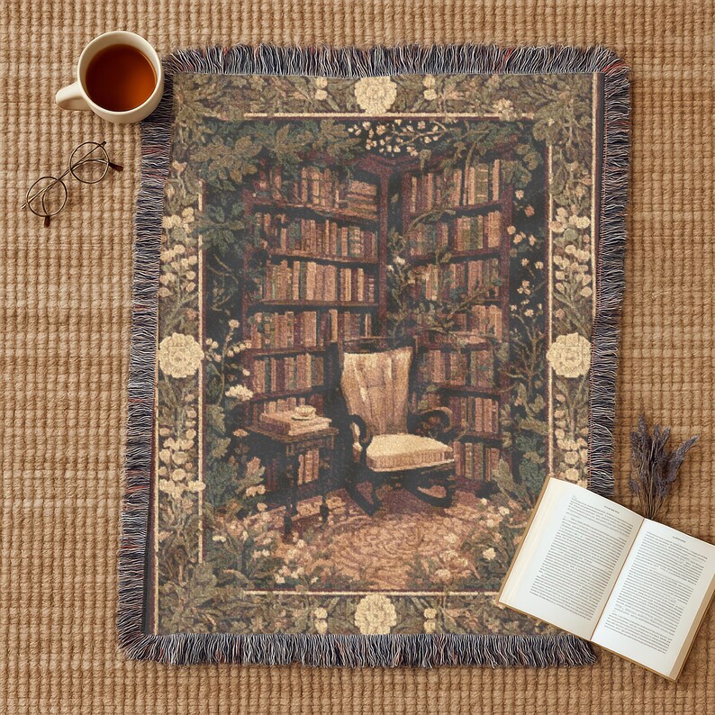 Woven blanket with a warm storybook library scene, draped over a reading chair.