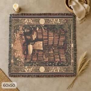 Woven blanket with a warm storybook library scene, draped over a reading chair.