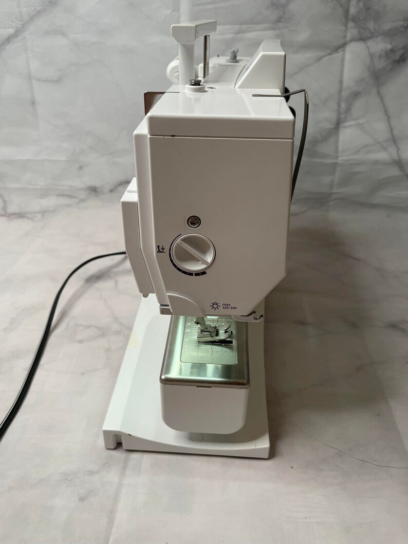 Bernina Artista 200 Sewing & Embroidery Machine Bundle turns On AS IS