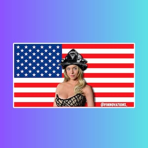 May include: A woman wearing a black firefighter helmet with a white star and a black and white patterned dress, standing in front of an American flag with the text "@vinnovations_" at the bottom.