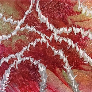 May include: Abstract painting with swirling white lines on a red, orange, and gold background. The painting has a glittery texture.