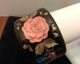 Reverse carved and painted lucite cuff