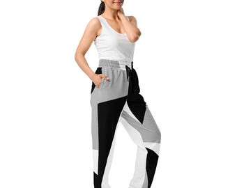 Joggers de pierna ancha con estampado integral: estilo deportivo, ropa informal con bolsillos laterales.