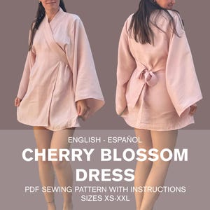 May include: A pink cherry blossom dress sewing pattern with instructions for sizes XS-XXL. The pattern is available in English and Spanish.