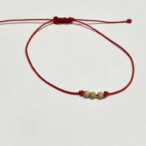 Red Cord Gold stardust lucky charm bracelet