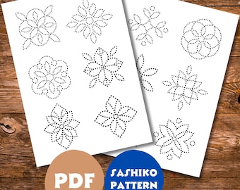 May include: Two printable PDF pages with black and white sashiko stitch patterns. The patterns are of various flowers and geometric shapes. The text "PDF" and "SASHIKO PATTERN" are printed on the pages.