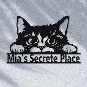May include: Black metal silhouette of a cat peeking over a sign that reads "Mia's Secrete Place".
