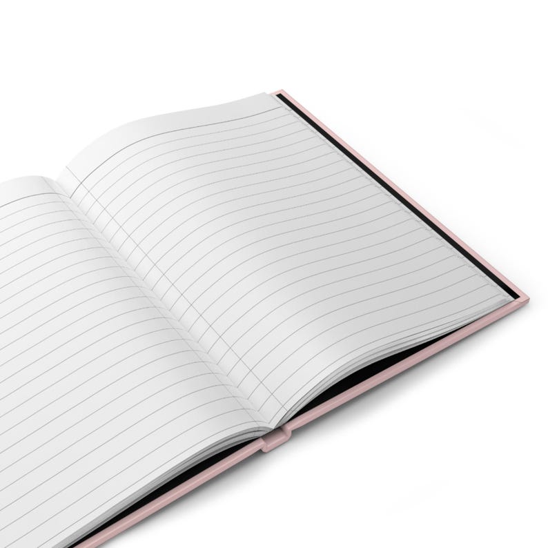 May include: A pink and black lined notebook with the pages open.
