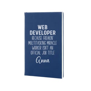a blue notebook with the words web development on it