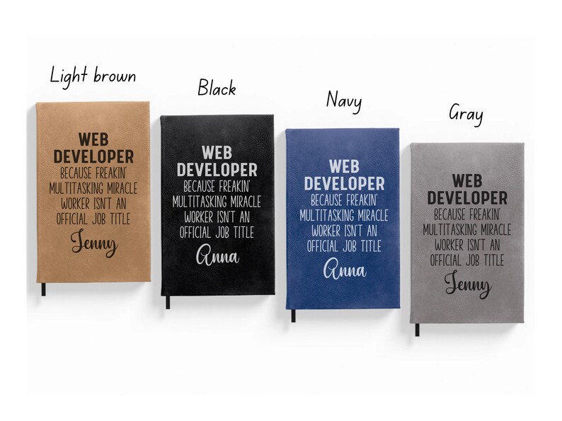 a set of three notebooks with different types of writing on them