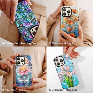 a woman holding a phone case with flowers on it