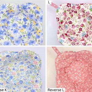 May include: Four quilted bowl cozies with floral patterns. The top left cozy features blue flowers on a white background. The top right cozy has pink and red flowers. The bottom left cozy has a mix of blue, pink, and yellow flowers. The bottom right cozy is pink with white flowers.