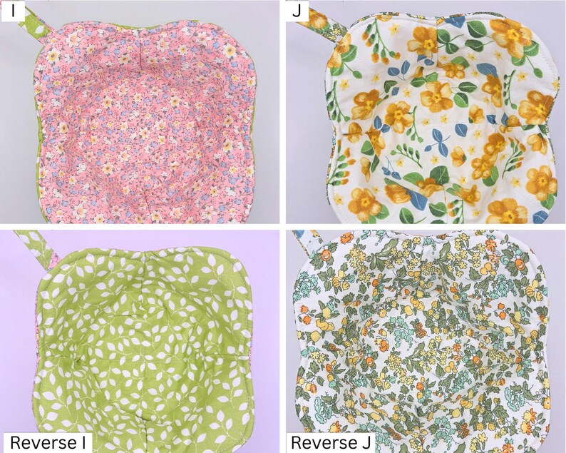 May include: Four fabric bowl cozies with floral patterns. The cozies have a square shape with a handle and are reversible. The patterns include pink, yellow, green, and a mix of floral designs. The cozies are designed to hold bowls.