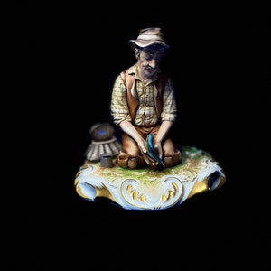 Capo-Di-Monte porcelain figurine