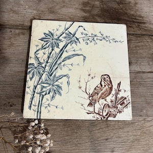 pretty old Terre de Fer trivet - French flea market -