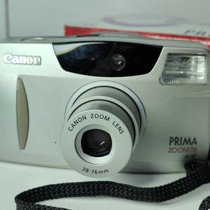Analogic camera 35mm  Canon Prima Zoom 76 38-76mm lens Full Working