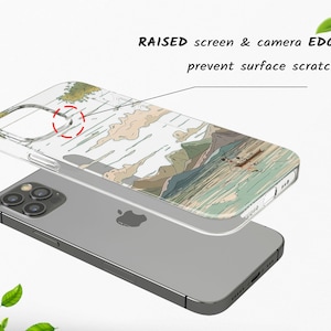 May include: A clear phone case with a raised edge around the camera and screen to protect it from scratches. The case has a colorful design of a mountain scene with a boat on a lake.