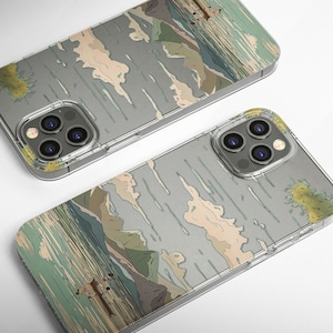 May include: Two iPhone 14 Pro Max phone cases with a Japanese-inspired design. The cases are clear and show a gray and white landscape with mountains and water. The cases have a raised camera bump to protect the phone's camera.