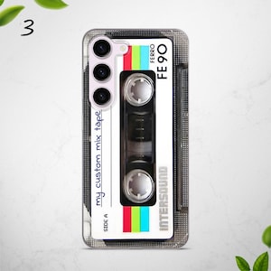 May include: A clear phone case with a retro cassette tape design. The case features the text "my custom mix tape", "SIDE A", "INTERSOUND", "FERRO", and "FE 90".