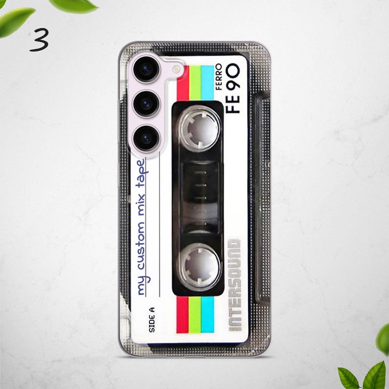 May include: A clear phone case with a retro cassette tape design. The case features the text "my custom mix tape", "SIDE A", "INTERSOUND", "FERRO", and "FE 90".