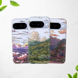 May include: Three phone cases with landscape illustrations. The cases feature designs of mountains, clouds, and buildings in various color palettes. The cases are clear, allowing the phone's design to be visible.