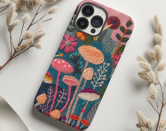 May include: A phone case with a colorful embroidered design featuring mushrooms, flowers, and foliage. The case has a teal background with pink, orange, and white accents. The case is designed to fit a smartphone.