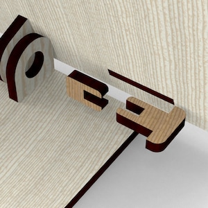 May include: A 3D rendering of the word "BE" in a stylized font. The letters are constructed from light wood with dark brown edges, set against a light wood-grain background and a white surface.
