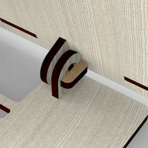 May include: A close-up of a wooden furniture joint with a curved, dark brown accent. The light-colored wood has a textured grain pattern. The joint is connected to a light-colored wooden panel with dark brown accents.
