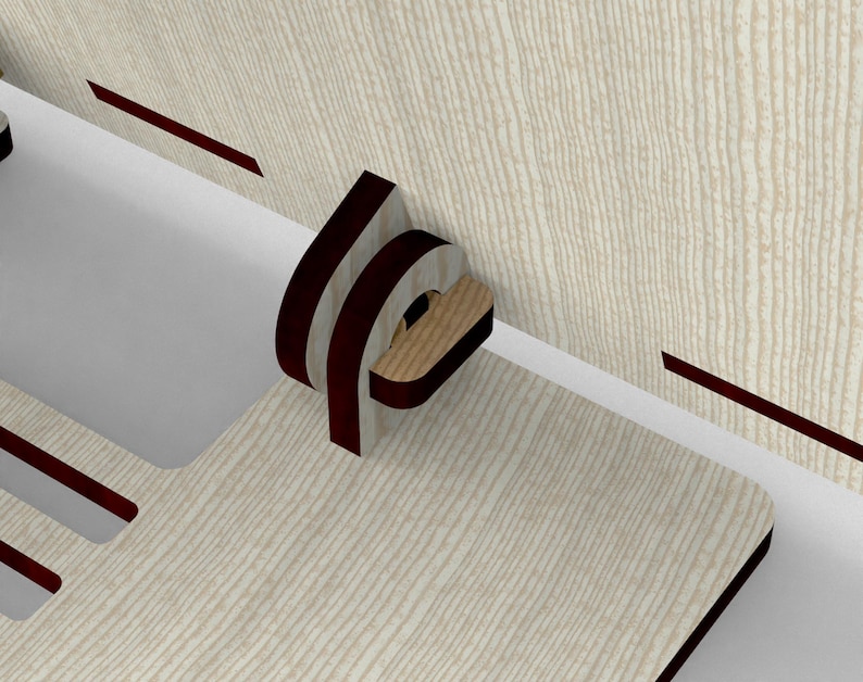 May include: A close-up of a wooden furniture joint with a curved, dark brown accent. The light-colored wood has a textured grain pattern. The joint is connected to a light-colored wooden panel with dark brown accents.