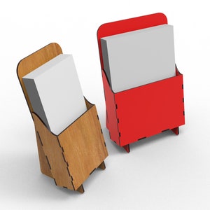 May include: Two wooden display stands with a white card inside. One stand is brown wood and the other is red.