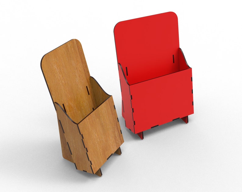 May include: Two wooden brochure holders, one is natural wood and the other is painted red. Both holders have a rectangular shape with a vertical front panel and a horizontal base.