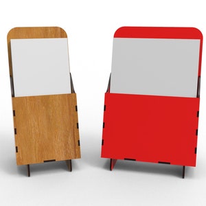 May include: Two blank card holders, one made of wood and one made of red acrylic. Both holders have a slot for a card and a stand to hold them upright.