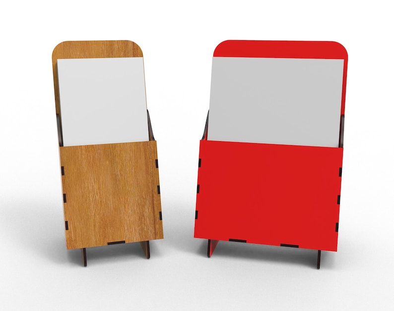 May include: Two blank card holders, one made of wood and one made of red acrylic. Both holders have a slot for a card and a stand to hold them upright.