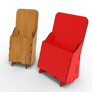 May include: Two wooden brochure holders, one brown and one red, with a slot for holding pamphlets or flyers. The holders are made of plywood and have a simple, modern design.