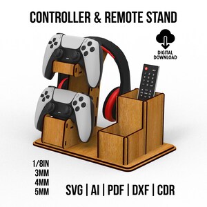 May include: A wooden controller and remote stand featuring two tiers for game controllers, a side hook for headphones, and a multi-compartment organizer for remotes. The text reads CONTROLLER & REMOTE STAND, 1/8IN, 3MM, 4MM, 5MM, SVG, AI, PDF, DXF, CDR.