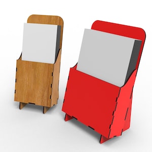 May include: Two wooden display stands with blank white cards. One stand is brown wood and the other is red.