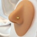 see more listings in the nose stud section