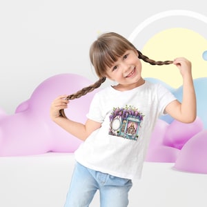 A young girl wearing a white t-shirt with a whimsical vintage shop illustration. The detailed storefront print adds charm to casual wear. Ideal for sublimation printing, fashion design, and unique personalized gifts.