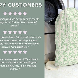 May include: A laundry bag with a floral pattern in light green and cream. The bag has a drawstring closure and a cream-colored strap. The letter "R" is displayed in a green frame. The text "HAPPY CUSTOMERS" is at the top.