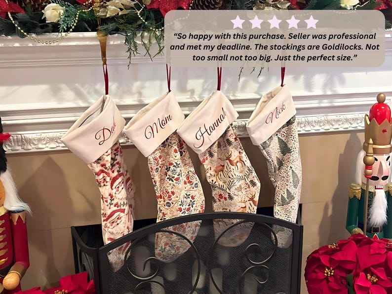 Customer photo of personalized family Christmas stockings with custom names hanging from a festive fireplace mantel, showing the velvet stockings styled in a real home.