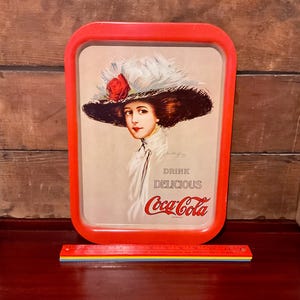 Vintage Coca-Cola-dienblad met reclame uit de jaren 70